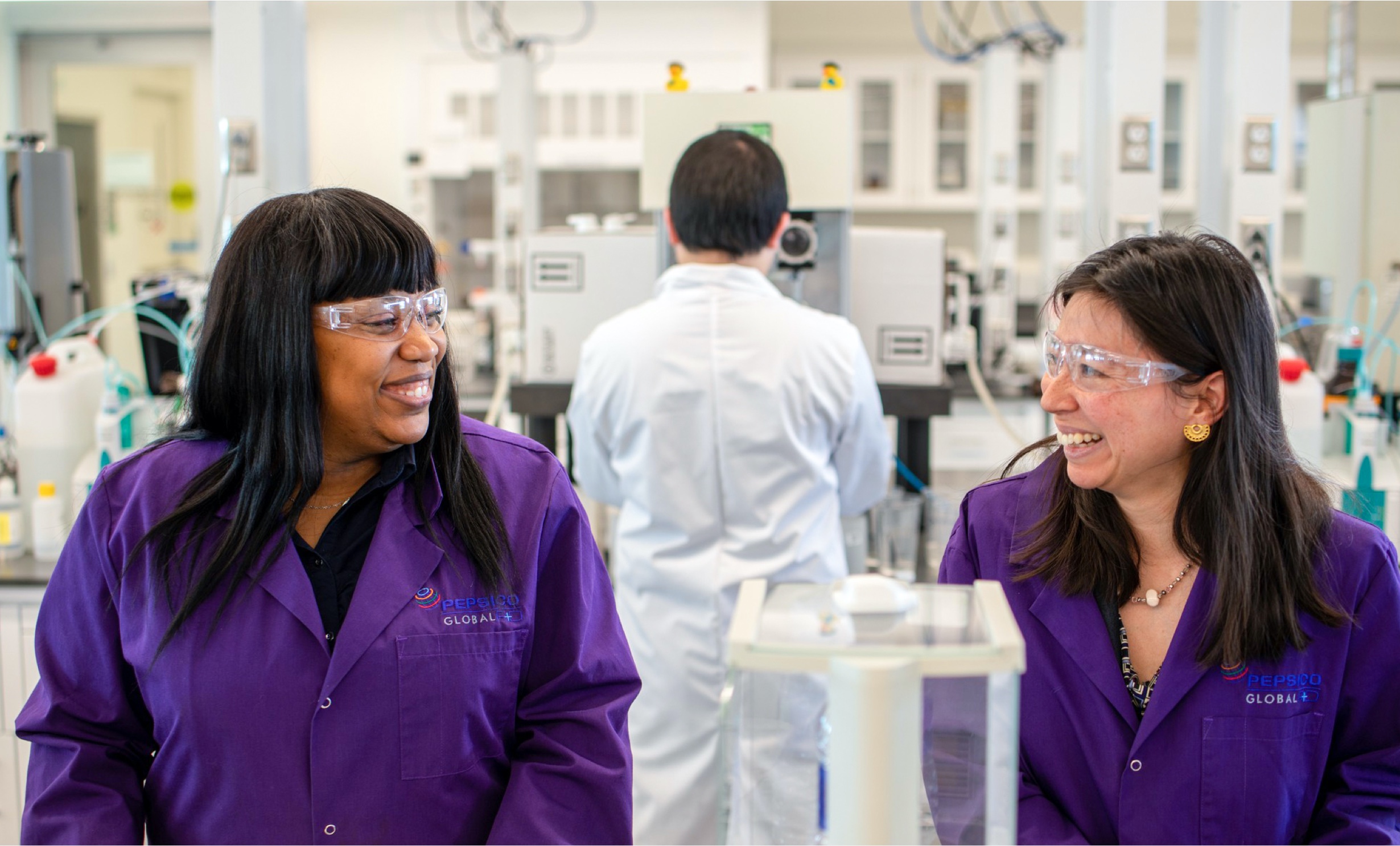 Two female scientists working in a lab